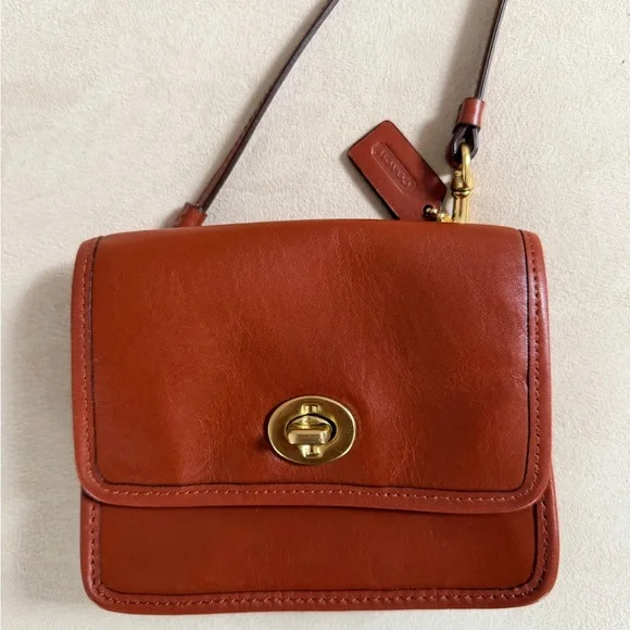 Coach Black, Brown, and Burgundy Crossbody Bags - Picture 2 of 15